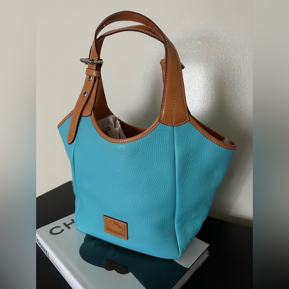 Brand New. Dooney & Bourke purse.